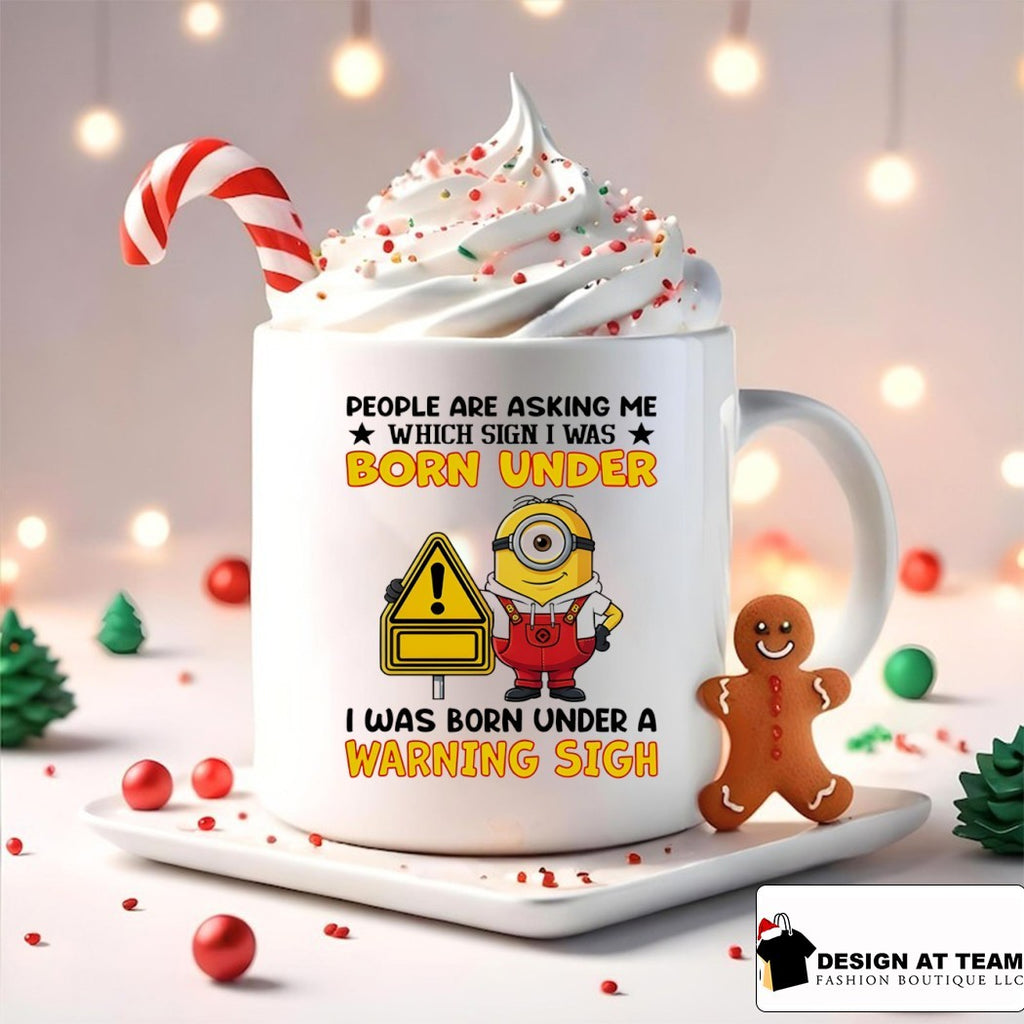 Minion people are asking me which sign I was born under I was born under a warning sign shirt