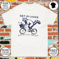 Raccoon riding a bicycle with an opossum get in loser trouble ain’t gonna make itself shirt