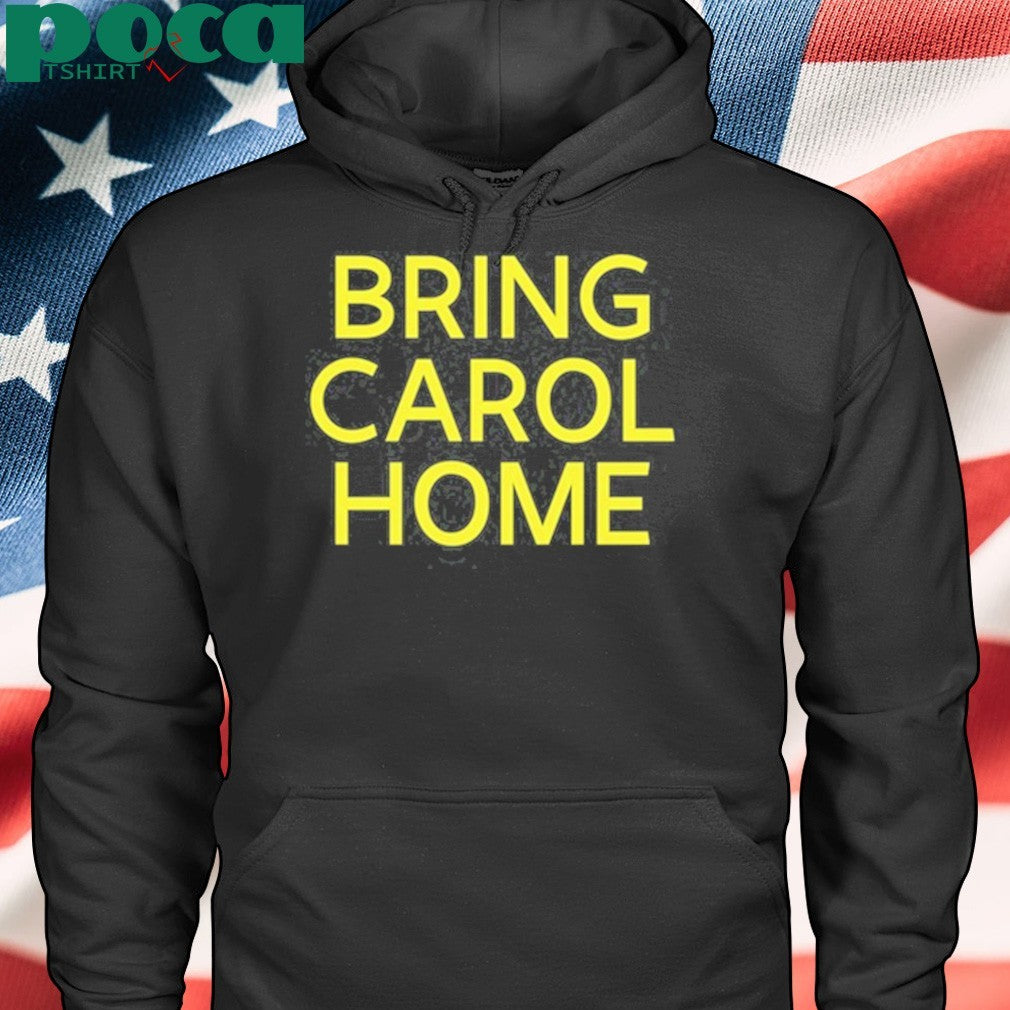 Sheryl Crow Wearing Bring Carol Home Shirt