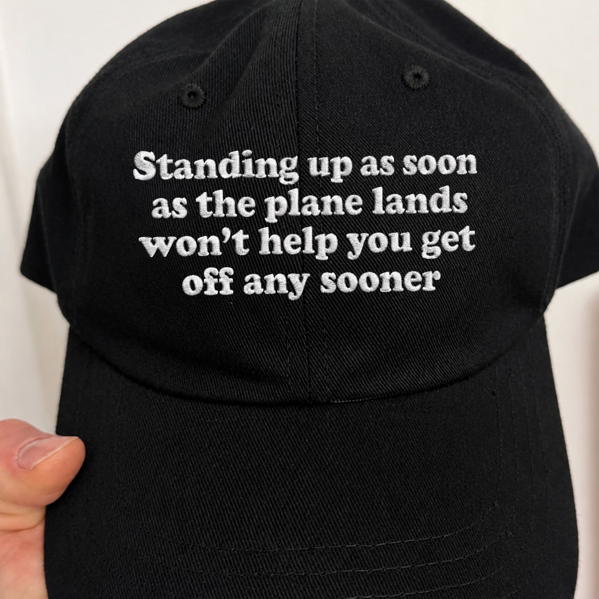 Standing Up As Soon As The Plane Lands Won’t Help You Get Off Any Sooner Hat