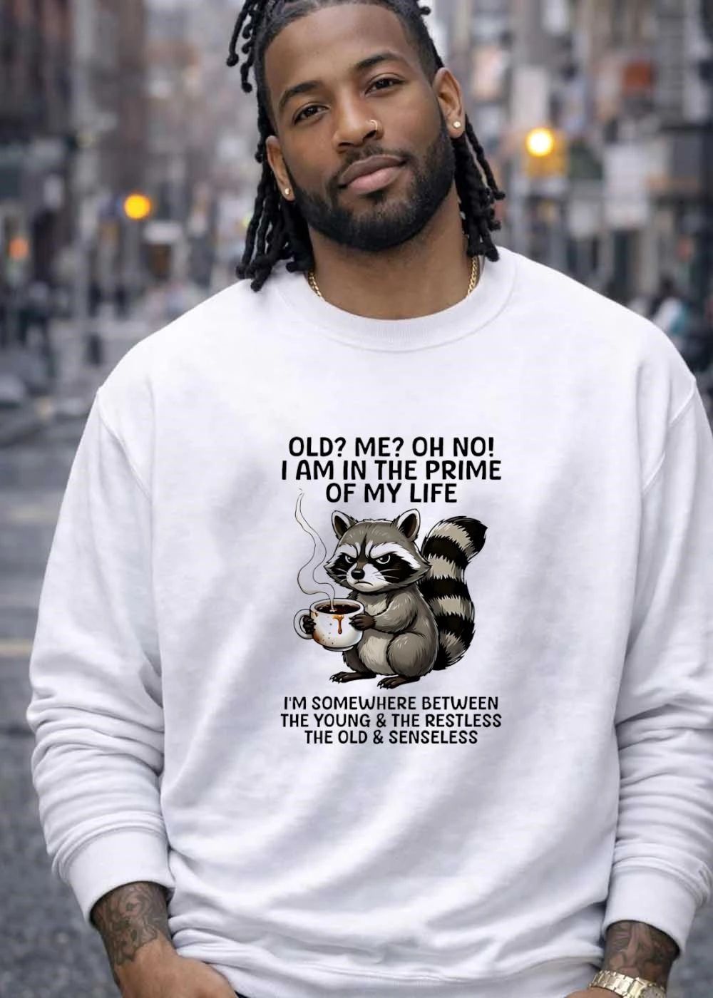 Funny Raccoon Holding Coffee Mug Old Me Oh No I Am In The Prime Of My Life I Am Somewhere Between The Young The Restless Old Senseless T-Shirt