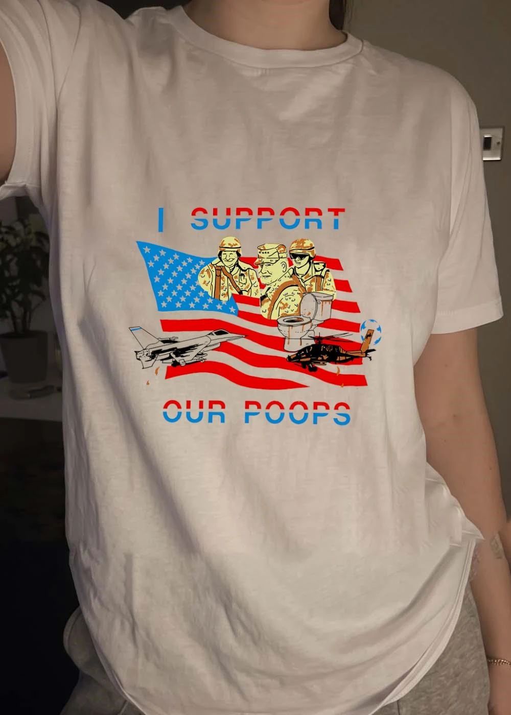 I Support Our Poops Military Satire American Flag Political Humor Toilet Protest Fighter Jet Helicopter 2026 Global Affairs Commentary Shirt