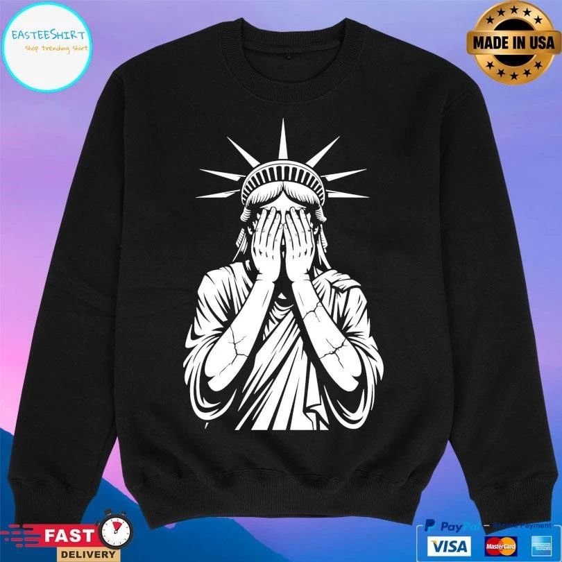 The Statue Of Liberty With Her Head In Her Hands T-shirts