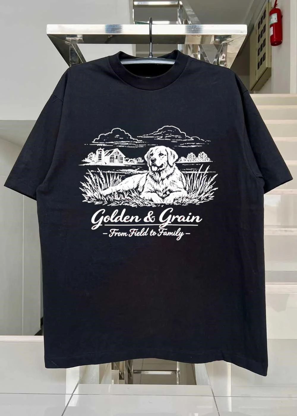 Golden & Grain From Field to Family Dog Lying in Grass T-Shirt